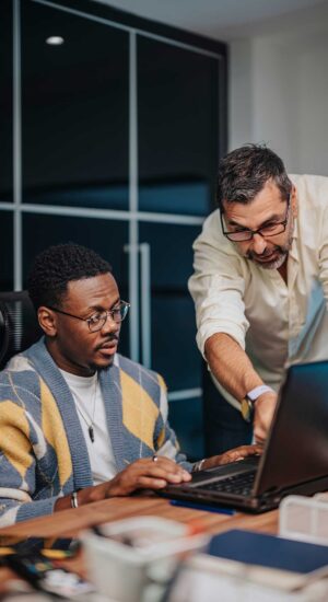 Engineers collaborating on product development project.